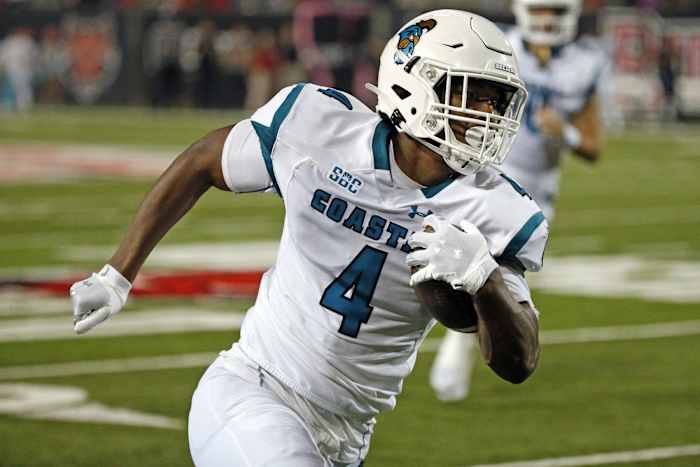 Oct 7, 2021; Jonesboro, Arkansas, USA; Coastal Carolina Chanticleers tight end Isaiah Likely (4) runs after the catch for a touchdown during the second half against the Arkansas State Red Wolves at Centennial Bank Stadium. Mandatory Credit: Petre Thomas-USA TODAY Sports